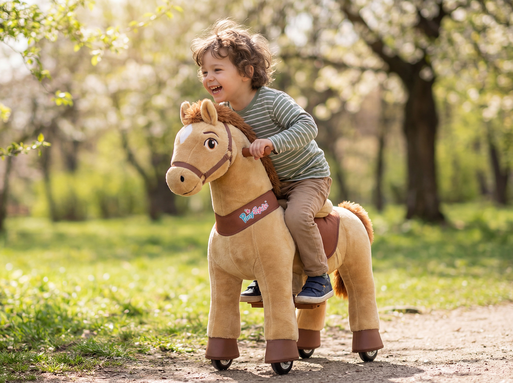 3-year-old riding PonyCycle horse toy