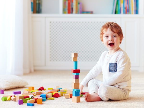 3-year-old boy building blocks