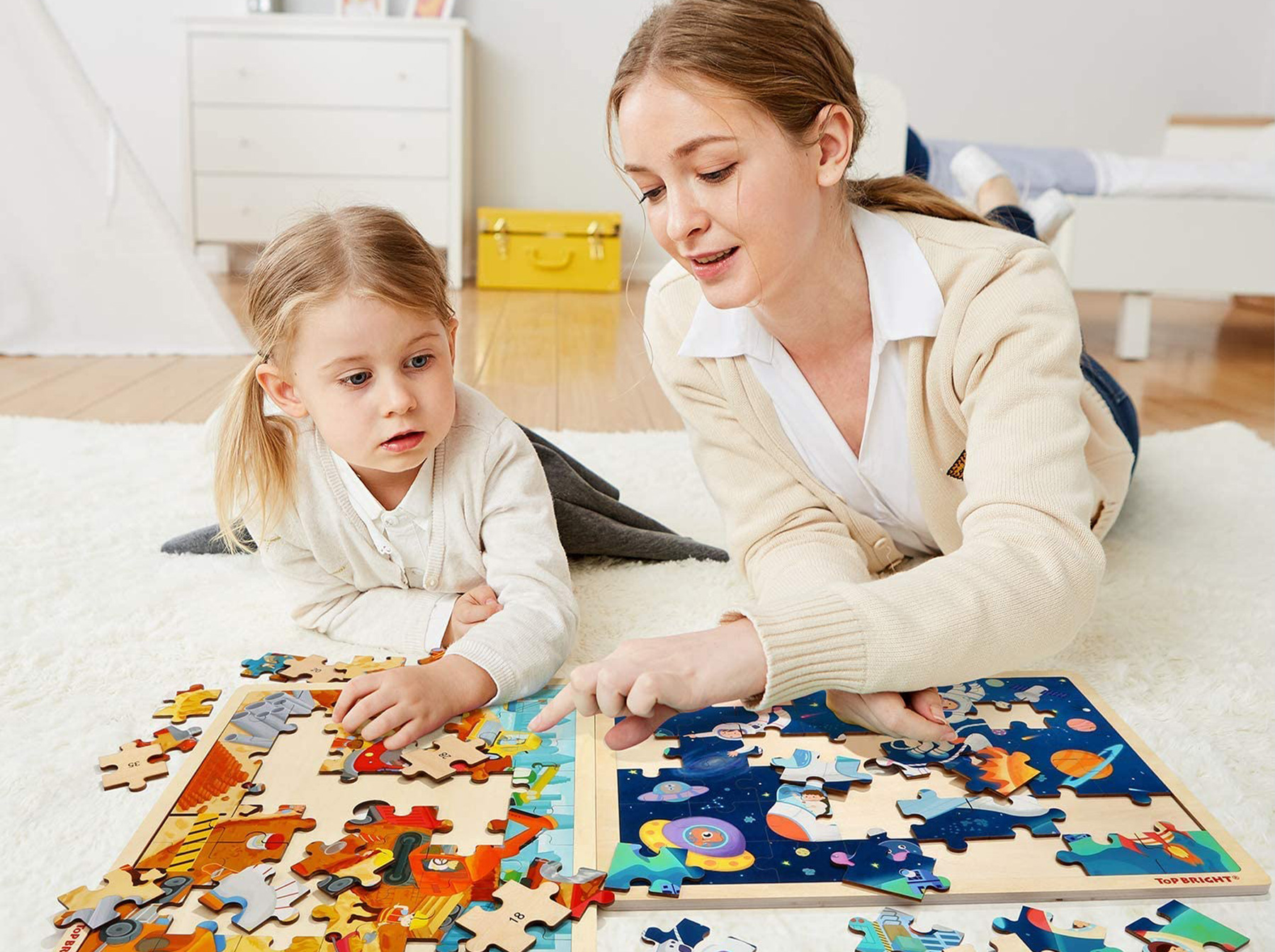 child playing large piece puzzle