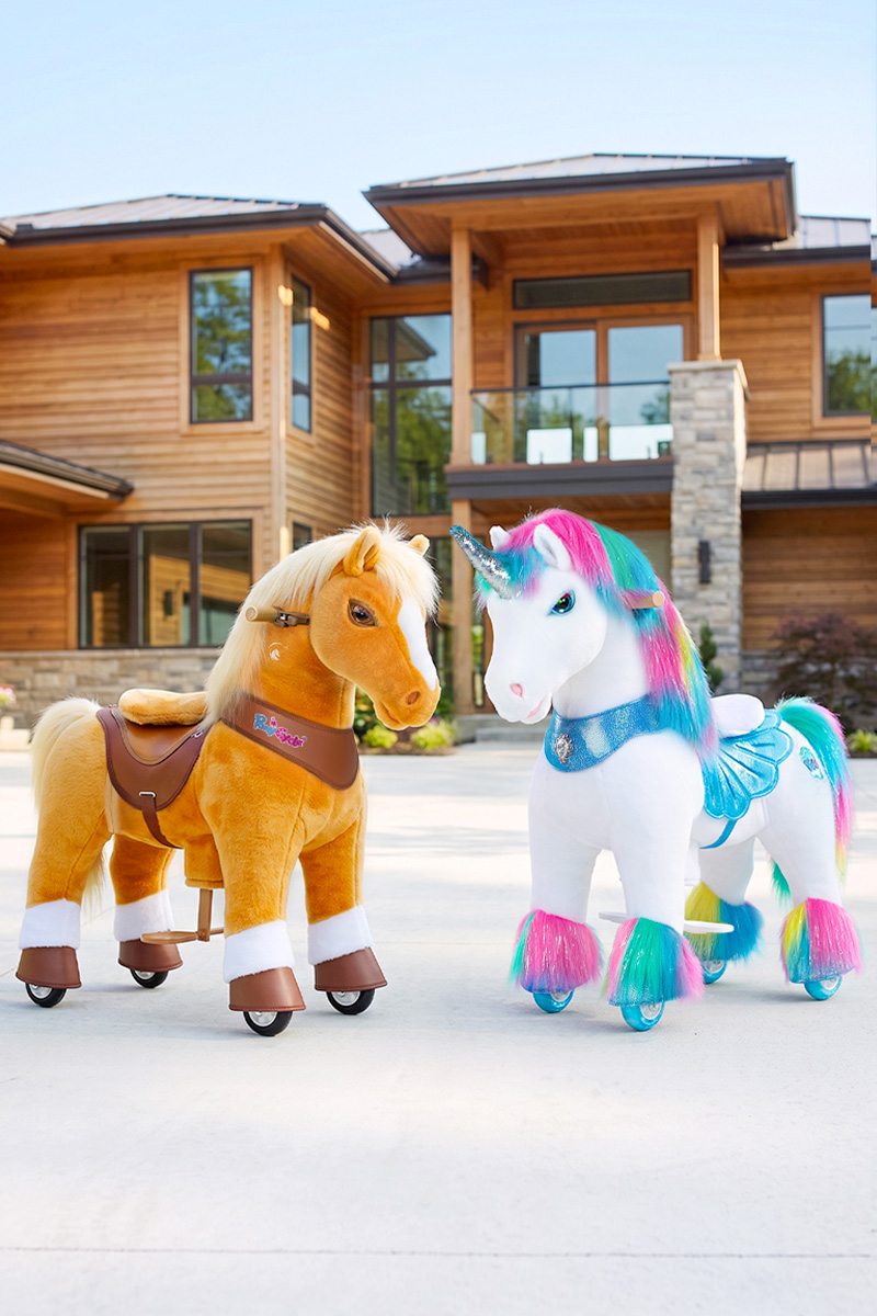 手机-ride-on-horse-and-unicorn-toy girl riding a ride-on unicorn toy that moves forward as she bounces
