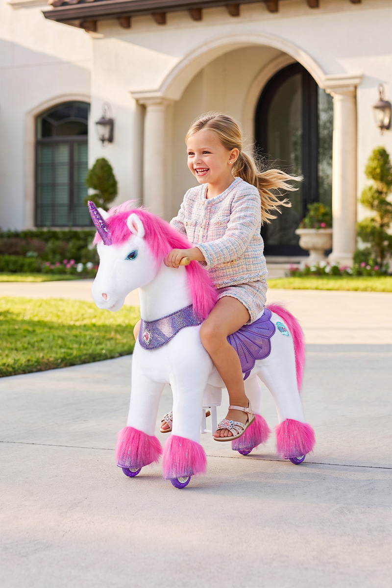 手机-ride-on-unicorn-toy-moving-forward-lawn child riding a ride-on horse toy down a hallway at home